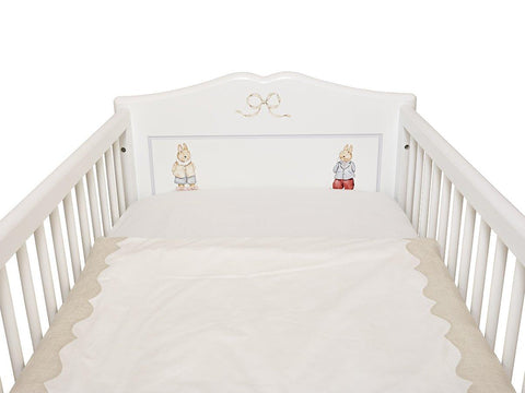 Dragons Cot Quilt with Scalloped Edging