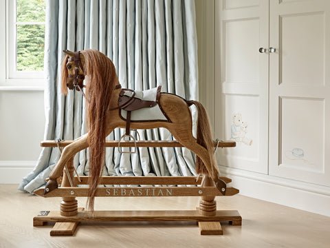 Dark waxed oak custom made rocking horse | Dragons of Walton Street